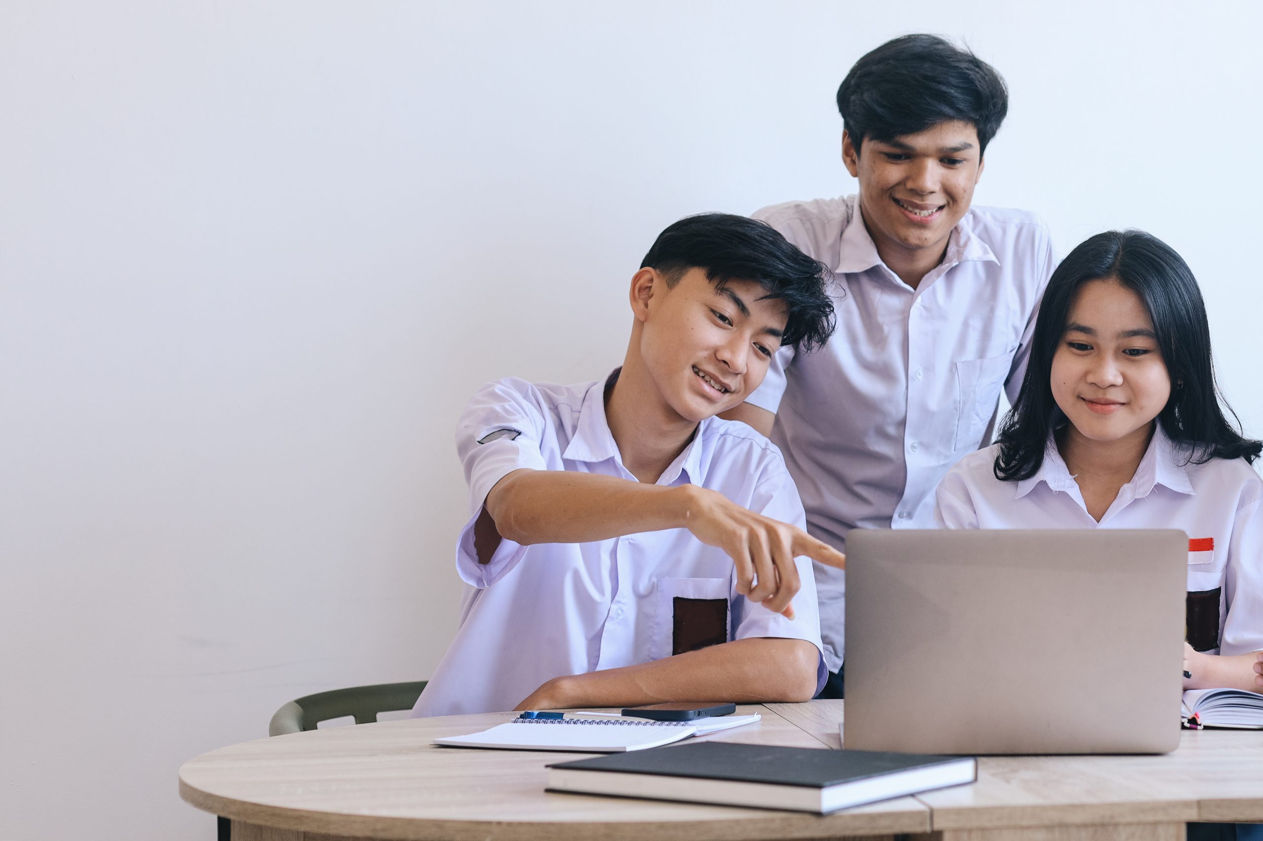 group asian teenage students wearing school uniform studying together classroom group asian teenage students wearing school uniform studying together classroom